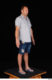 Louis blue shirt casual dressed flip flop jeans shorts standing…